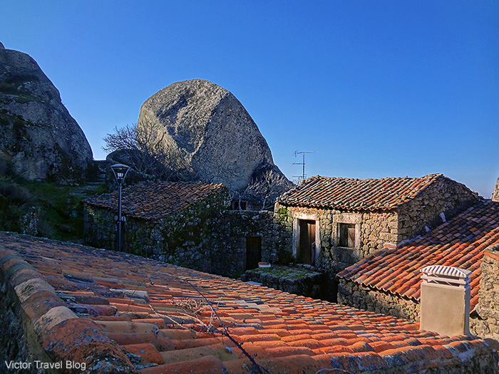The houses between boulders in the village of Monsanto. Portugal.