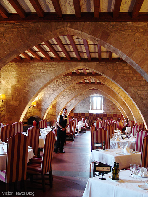 A dining room of the Parador Duques De Cardona Hotel, Catalonia, Spain.